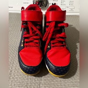 Under armor baseball cleats size 12.